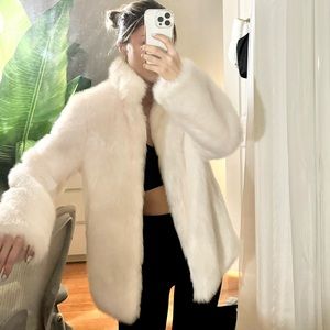 White faux fur coat